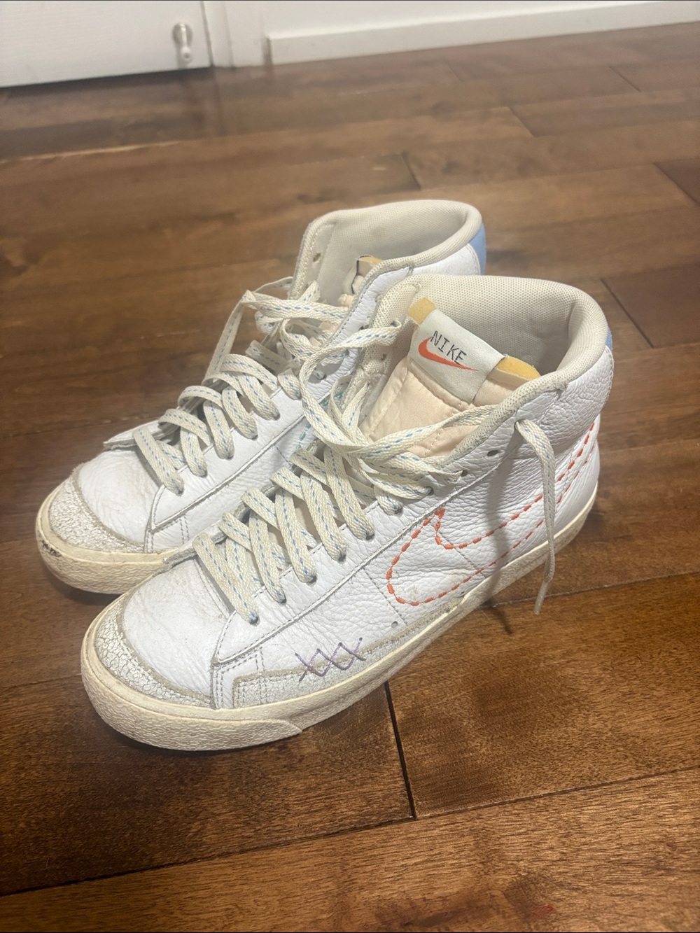 Nike White High-Top Sneakers with Orange Stitch Swoosh